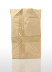 Brown   paper bag on white background