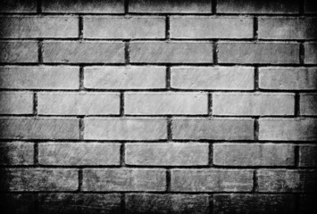 Grungy bricks wall. Background with dramatic mood.