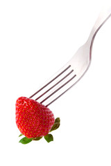 fork and fresh strawberry