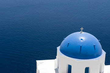 blue dome of church in santorini