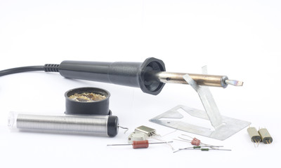 Soldering iron, rosin ,solder and resistors on white