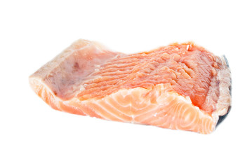 large piece of salted salmon, isolated on a white background