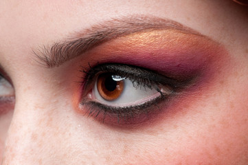 Obraz premium Closeup eyes make-up zone. Purple and golden colors