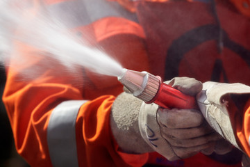 fire fighter hosing during a competition 01