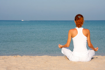 Fototapeta na wymiar Meditation on the beach