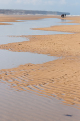 promeneur sur la plage