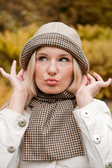 pretty autumn girl with brown purse