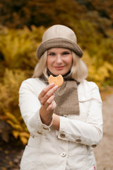 pretty autumn girl with brown purse