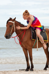 Obraz premium Reiten am Strand