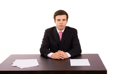 young business man on a desk, isolated on white