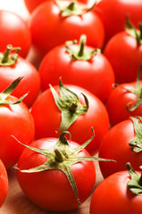 Red tomatoes arranged at the market stand