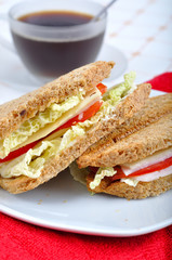 fresh and delicious classic club sandwich with coffee