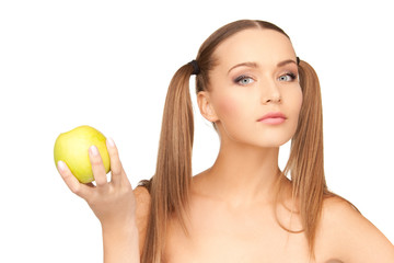 young beautiful woman with green apple