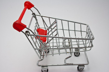 isolated shopping cart on the white