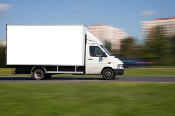 Panning image of truck with space for your advertisement - 25399319