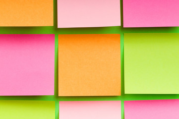 Reminder notes on the bright colorful paper