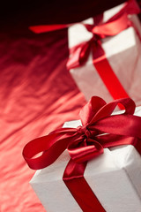 Beautiful gift boxes on the red background