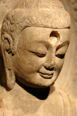 Fototapeta na wymiar Face of stone Buddha in china