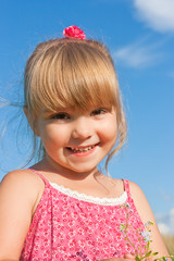 Smiling girl on nature