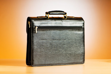 Leather case on the table against background