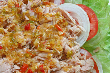 Thai spicy Tuna with Green salad onion and tomato, closeup