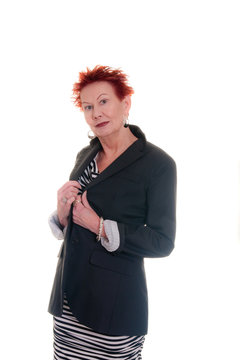 Older Woman with Red Hair Holding Lapels