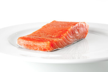 fresh smoked salmon on white plate
