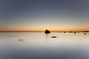 Fototapeta na wymiar Sunset over ocean. Wide angle photo.
