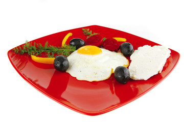 fried egg on red dish