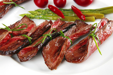 meat and vegetables on white plate