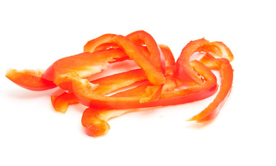 slices paprika over white background