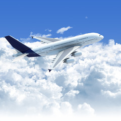 Naklejka premium samolot lecący nad chmurami widok z góry z boku