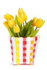 Pot of colorful tulips isolated on white