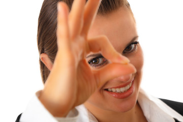 Fototapeta premium modern business woman looking through ok gesture isolated