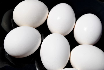 White Eggs Over Black