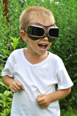 boy with glasses outdoors