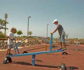 Two boys on the playground.
