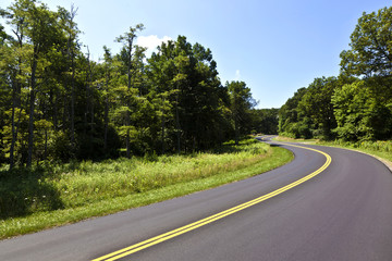 Fototapeta na wymiar Beautiful scenic country road curves through National Park