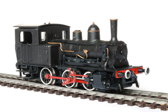 Vintage black model railway isolated on white background