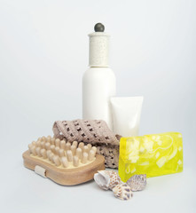 cosmetic set with wooden massager, handmade soap and seashells