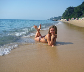 beautiful girl on sunny beach