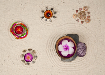 Candles with decoration on the sand background