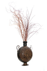 Composition of brown decorative vase filled with red artificial