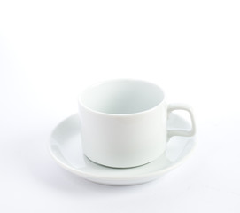 cup on plate on white background