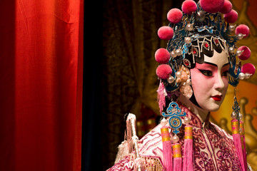 Naklejka premium chinese opera dummy and red cloth as text space ,it is a toy,not