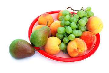Naklejka na ściany i meble Grapes, peaches and pears in the tray