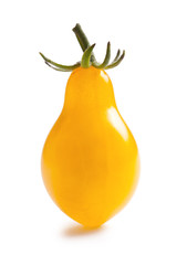 yellow tomato on white background