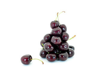cherries piled up and isolated on white