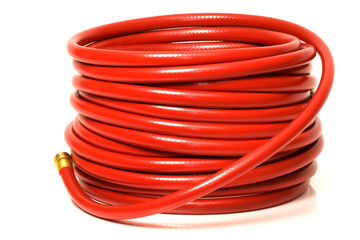 Red Garden Hose - studio on white