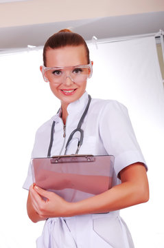 Young nurse in white uniform